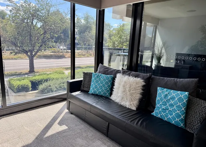 Midnight Luxe: Chic Braddon Apartment with Pool and Sauna Canberra